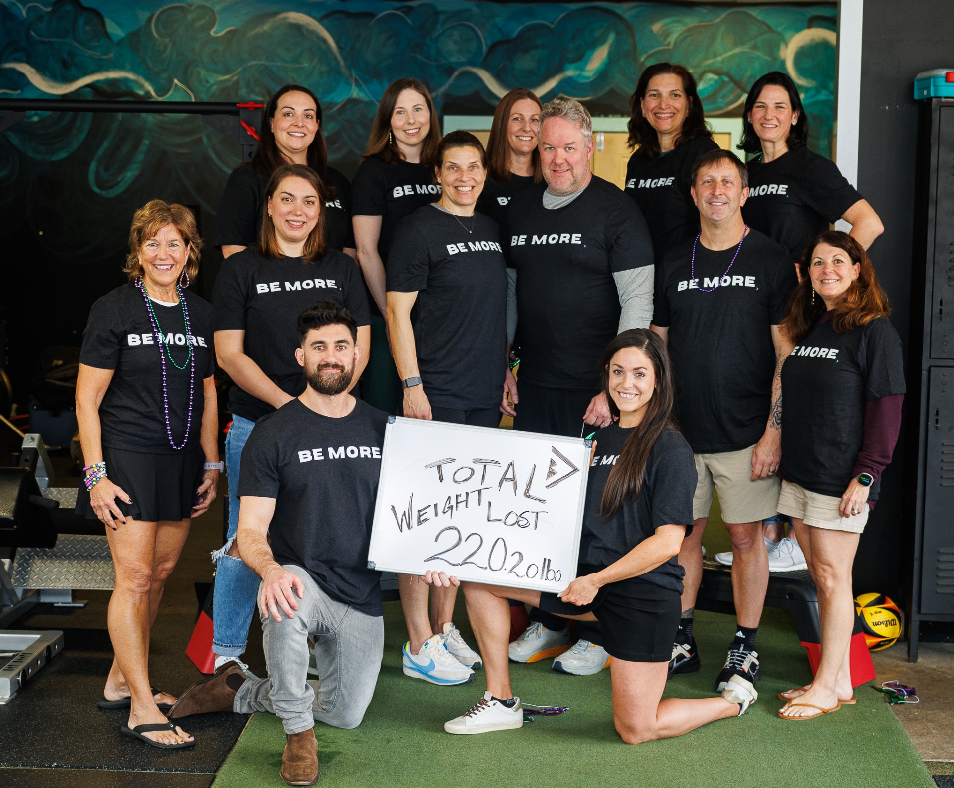 Human Performance members celebrating 2,202 lbs of total weight lost